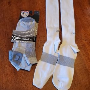 Bundle of 2 pairs of size large athletic socks.